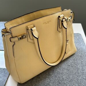 Henri Bendel lemon color bag with shoulder strap